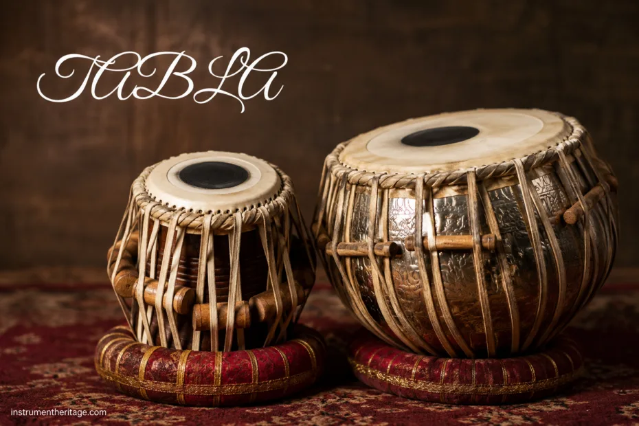 Tabla: The Indian drums feature a pair with intricate designs, showcasing traditional craftsmanship and musical versatil…